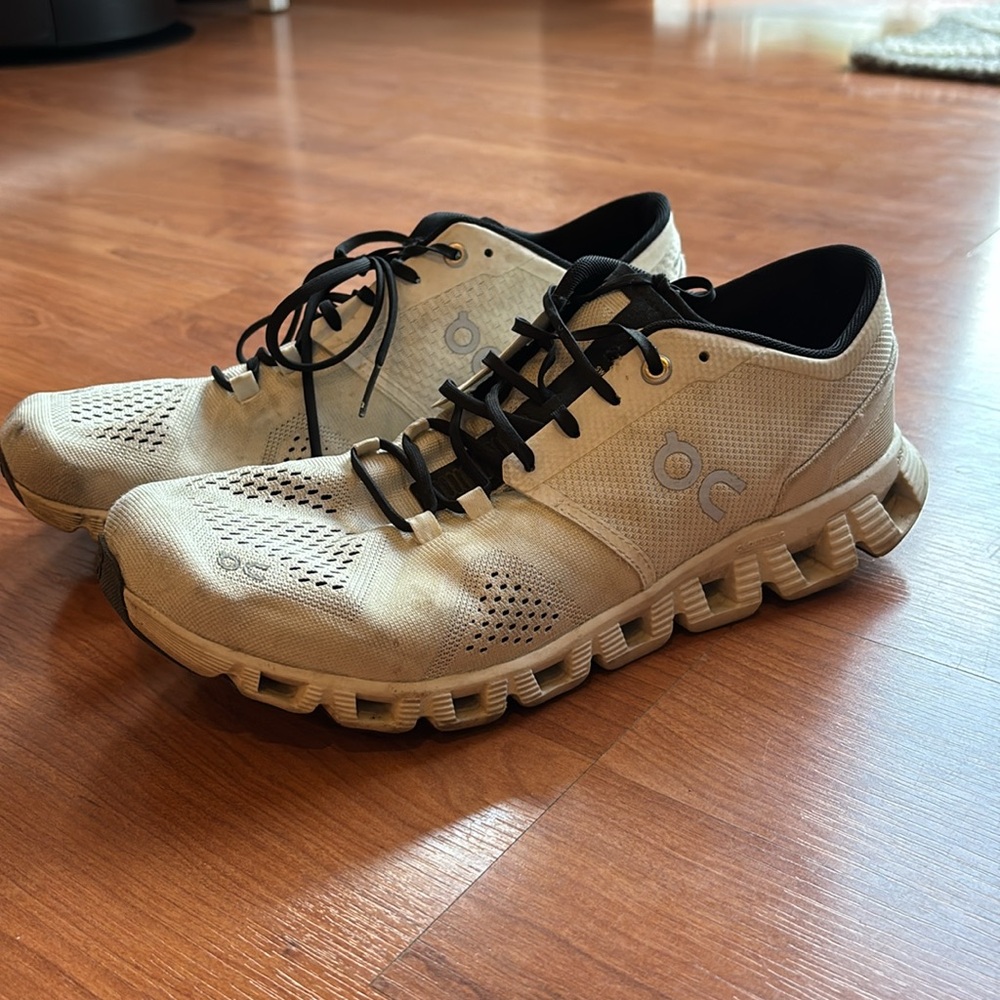 On Running Cream Black Athletic Shoes with Modern Design